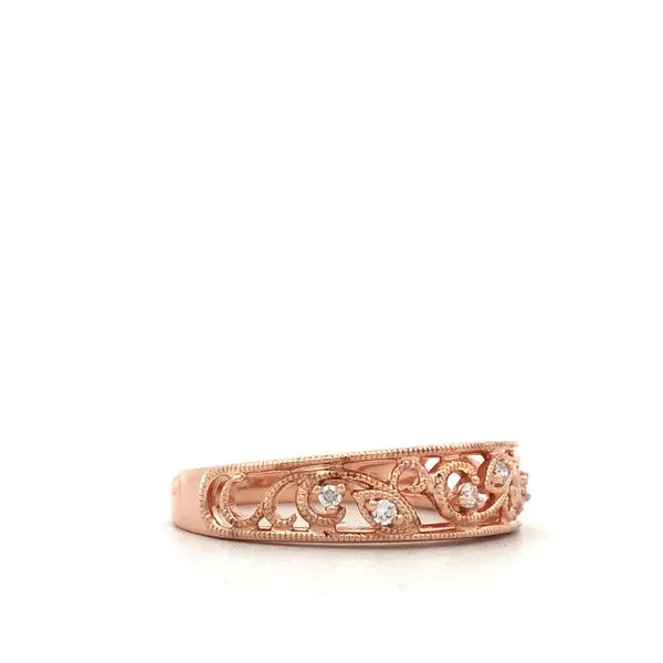 This ladies diamond wedding band is made of 14K rose gold and features a.05 carat diamond. The band has a polished metal finish  Image 2 Hudson Valley Goldsmith New Paltz, NY