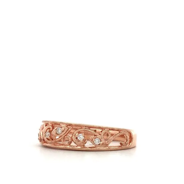 This ladies diamond wedding band is made of 14K rose gold and features a.05 carat diamond. The band has a polished metal finish  Image 3 Hudson Valley Goldsmith New Paltz, NY