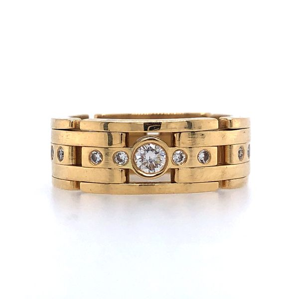 ESTATE 18k yellow gold flexible ring featuring 0.25cttw of diamonds all flush or bezel set along the top portions of the ring. N Hudson Valley Goldsmith New Paltz, NY