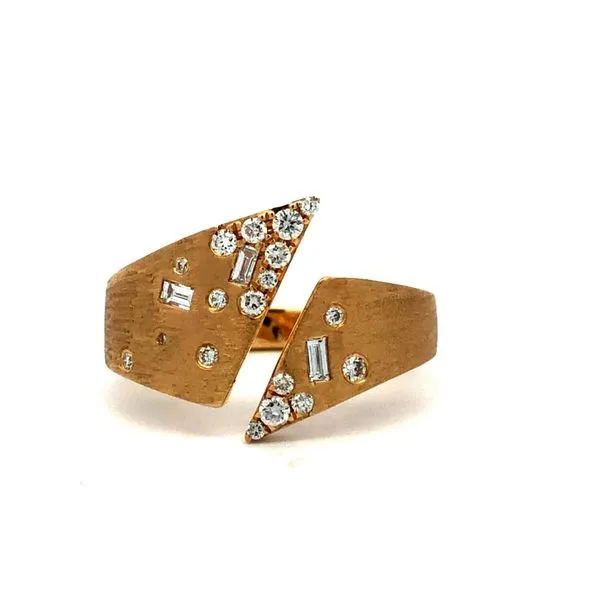 Made of 14K yellow gold, this split ring features 0.30cttw diamonds scattered along both top sections. The satin finish adds a subtle touch of elegance to this women's fashion ring. Hudson Valley Goldsmith New Paltz, NY