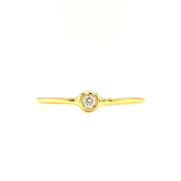 14k yellow gold hand fabricated thin band featuring 0.03ct round diamond flush/bezel set along the top of the ring. Hudson Valley Goldsmith New Paltz, NY