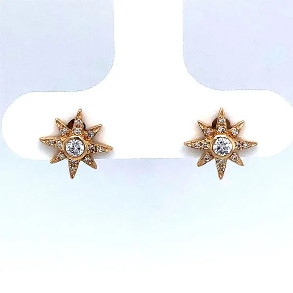 14k yellow gold star designed stud earrings featuring 0.13cttw diamonds set inside of the star. This design features different d Hudson Valley Goldsmith New Paltz, NY