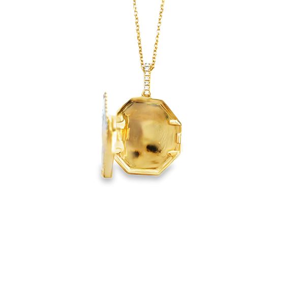 14k yellow gold locket necklace in hexagonal shape featuring 0.20cttw diamonds set in moon shape center and around outer edge of necklace & across front of bail, with turquoise enamel. Includes 16 - 18