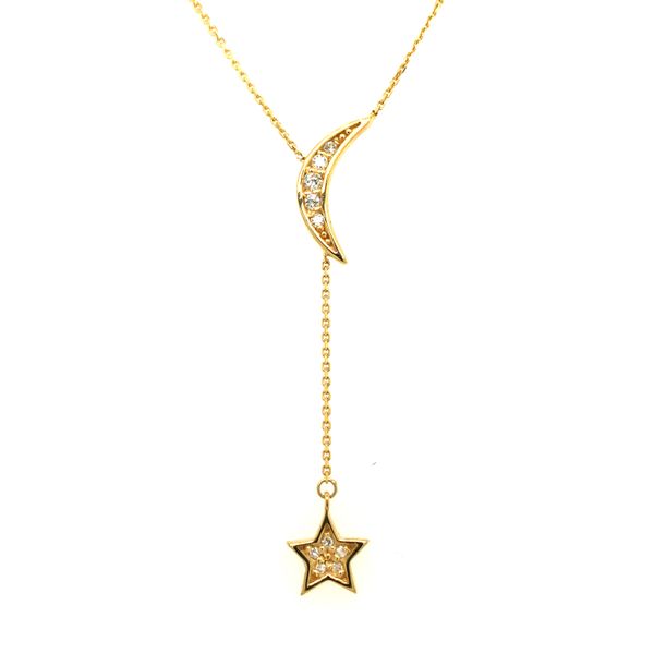 14k yellow gold lariat necklace featuring moon and star drop designs on a 16