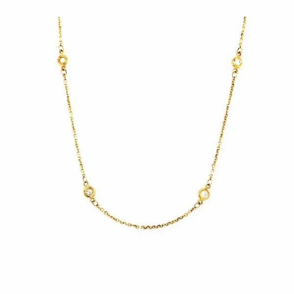 14k yellow gold diamond by the yard necklace featuring 0.25cttw bezel set brilliant round diamonds. Hudson Valley Goldsmith New Paltz, NY