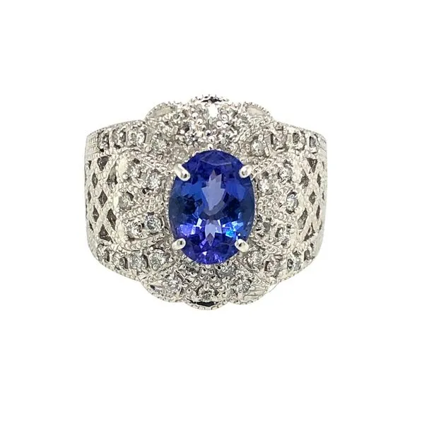 ESTATE 14k white gold Tanzanite & Diamond vintage style ring. Prong set in the center features a vivid purple/blue oval tanzanit Hudson Valley Goldsmith New Paltz, NY