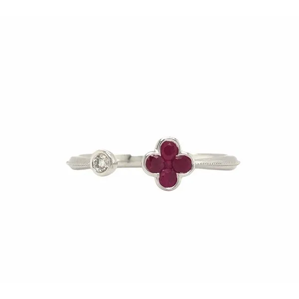 14k white gold open design ring featuring ruby gemstones and 0.05ct round brilliant diamond. A textured milligrain center runs f Hudson Valley Goldsmith New Paltz, NY