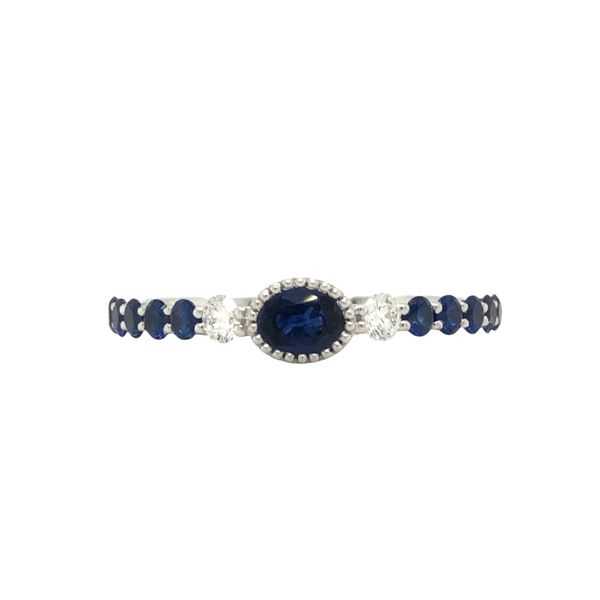 18k white gold blue sapphire and diamond ring featuring a 0.28ct 4.5x3.5mm oval blue sapphire, 0.11cttw diamonds and 0.40cttw bl Hudson Valley Goldsmith New Paltz, NY