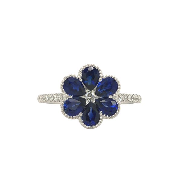 18k white gold floral design ring featuring 1.73cttw genuine blue sapphire gemstones accented with 0.21cttw round brilliant diam Hudson Valley Goldsmith New Paltz, NY