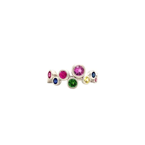 18k white gold ring featuring pink, blue, and yellow genuine sapphires and a tsavorite garnet. The ring has a matte finish throu Hudson Valley Goldsmith New Paltz, NY