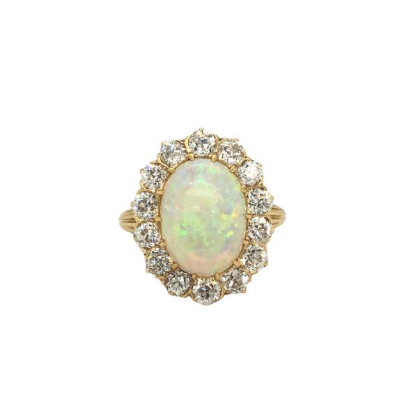 ESTATE 18k yellow gold ring featuring an oval cabachon 3.17ct Australian Opal surrounded by approximately 2.00cttw Old Euro cut  Hudson Valley Goldsmith New Paltz, NY