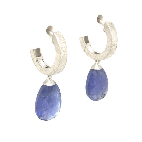 Sterling silver brush finish huggie earrings featuring faceted tear drop shape tanzanite gemstones Image 2 Hudson Valley Goldsmith New Paltz, NY