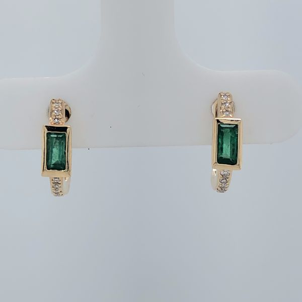 14k yellow gold huggie style earrings featuring 0.24cttw, emerald cut, green emeralds bezel set in the center of the earring and Image 2 Hudson Valley Goldsmith New Paltz, NY