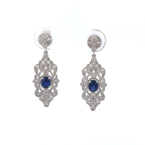 18k white gold post earrings featuring blue sapphire gemstone centers accented by 0.21cttw diamonds alng the vintage inspired designs. Hudson Valley Goldsmith New Paltz, NY