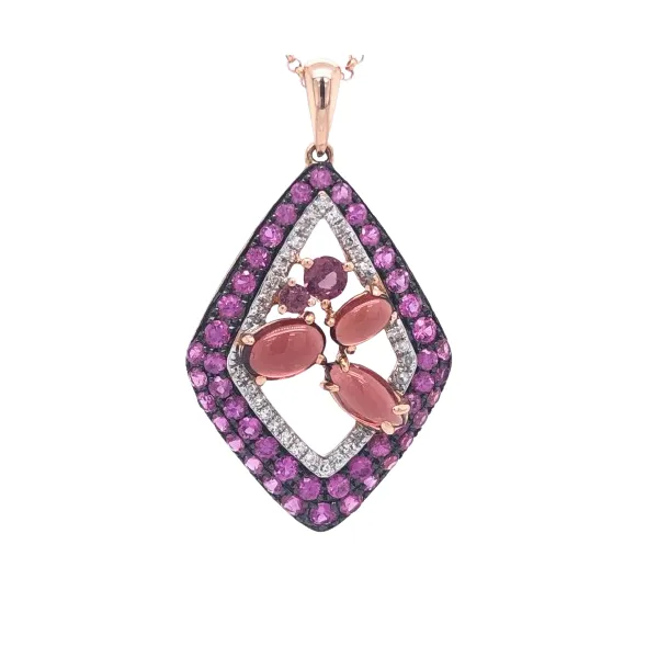 14k rose gold necklace featuring 0.10cttw diamonds, 1.23cttw pink sapphires, and oval cabachon garnets. The necklace includes a 16