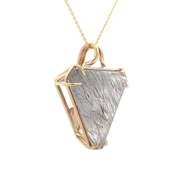 14k yellow gold custom pendant featuring triangular tourmilated quartz center gemstone and accenting three round ruby gemstones. Set below and hanging from the bottom of the pendant is a round faceted Ethiopian opal, and a 0.69ct pear shape faceted blue T Image 2 Hudson Valley Goldsmith New Paltz, NY