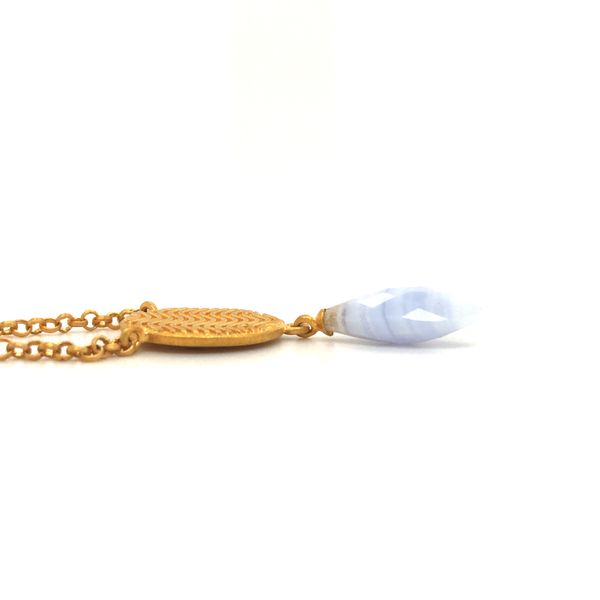 sterling silver with 24k vermeil necklace featuring calming wave design disc and striped chalcedony tear drop, includes 18