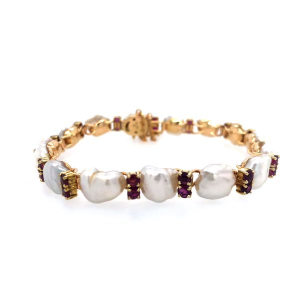 ESTATE 14k yellow gold bracelet featuring keshi pearls and rhodolite garnets. The bracelet has a safety chain attached to the lo Hudson Valley Goldsmith New Paltz, NY