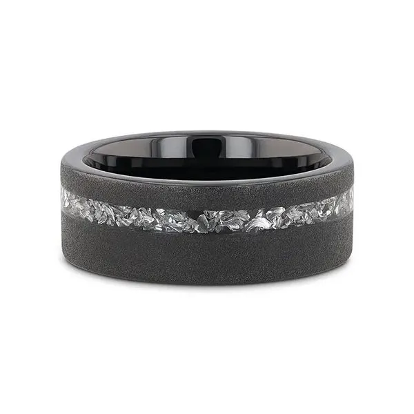 The Abyss men's wedding band is made of black tungsten and features a sandblasted finish. It has a unique design with meteorite  Hudson Valley Goldsmith New Paltz, NY