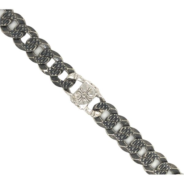 Sterling silver oxidized textured curb bracelet with center design charm, high polished silver. Sterling silver oxidized texture Hudson Valley Goldsmith New Paltz, NY