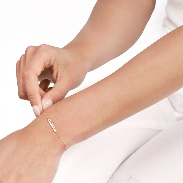 This Mama Nameplate Adjustable Bracelet is perfect for moms or anyone who loves being a mom. Made of precious metal, this bracelet features a doodle font that spells out 'MAMA'. It is a beautiful and meaningful piece of jewelry. Image 2 Hudson Valley Goldsmith New Paltz, NY