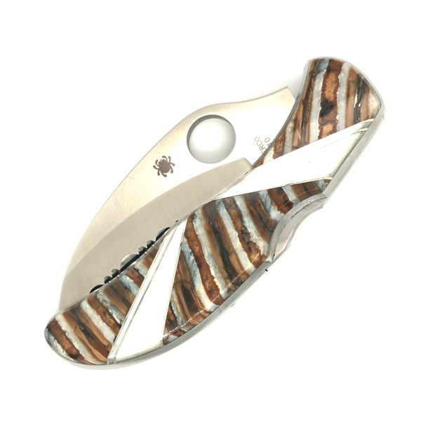 SpyderCo Harpy Serrated blade featuring fossolized mammoth tooth and mother of pearl inlay design SpyderCo Harpy Serrated blade  Hudson Valley Goldsmith New Paltz, NY