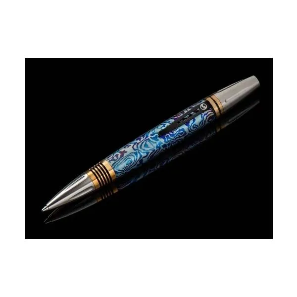 CARIBE 9 features a barrel sculpted and hand-finished from stylish patterned and anodized titanium. The exceptional and distinctive titanium pattern is flanked by brass spacers with deep grooves for a secure grip, and the tip and top section are crafted f Hudson Valley Goldsmith New Paltz, NY