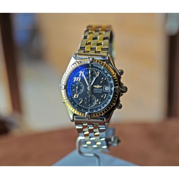 Breitling Chronomat Two Tone 18k Gold/Steel Black Dial 39mm Ref. D13050/A355 Preowned Huffords Jewelry Frontenac, MO