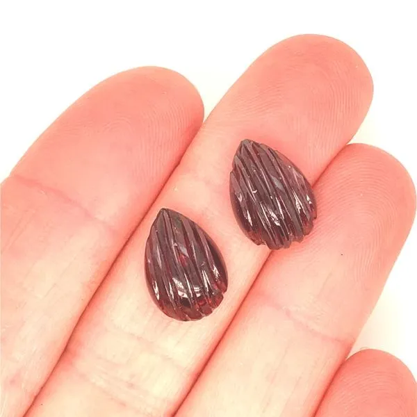 A Pair of 13x9mm Carved Cabachon Garnets Image 3 Jaymark Jewelers Cold Spring, NY