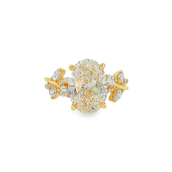 14K Yellow Gold 4.01ct Oval Lab Grown Diamond Engagement Ring that is F in Color and VS1 in Clarity with .62ctw of Accent Lab Grown Diamonds. Jeff Dennis Jewelers Gardendale, AL