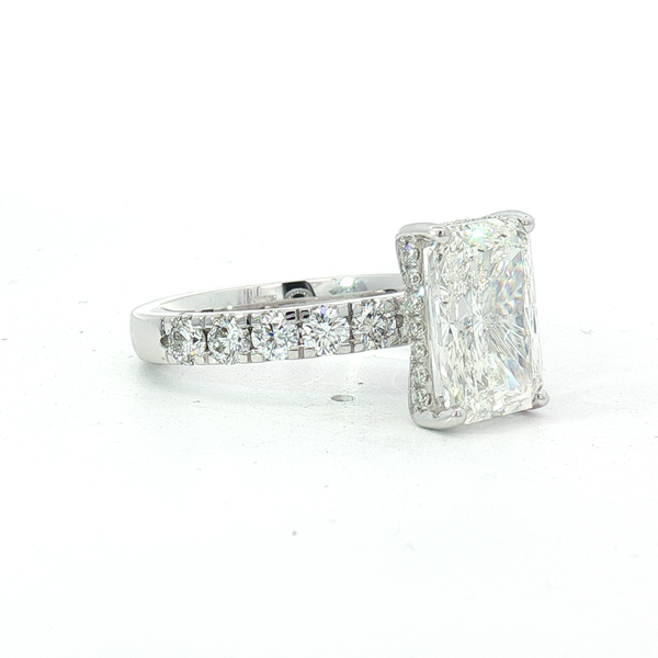 Ladies White 14 Karat Lab Grown Engagement Ring With 4.03ct Radiant Diamond Vs1 in Clarity and F in Color and 1.11ct tw Round Accent Diamonds in Band and Hidden Halo. The total weight for this ring is 5.14cts. Image 2 Jeff Dennis Jewelers Gardendale, AL