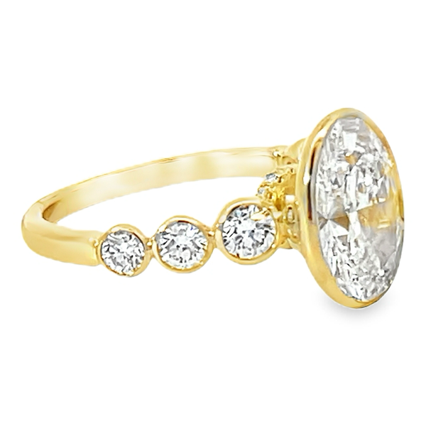 Ladies Yellow 14 Karat Lab Grown Engagement Ring With 3.02ct Oval  Center Diamond, F in color and  VS2 in clarity, set on a Diamond Band with 0.73ct tw Round Diamonds. The total carat weight of this ring is 3.75. Image 2 Jeff Dennis Jewelers Gardendale, AL