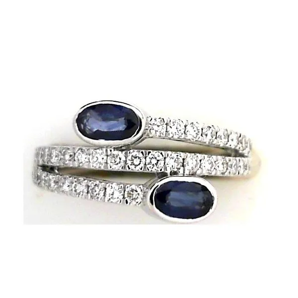 14 Kt White Gold Sapphire And Diamond By-Pass Style Ring