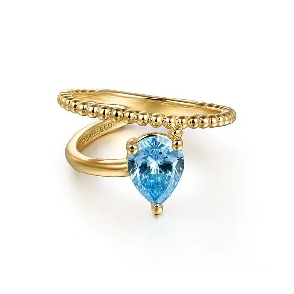 14K Yellow Gold Beaded Bypass Ring with Blue Topaz Jim Kryshak Jewelers Wausau, WI