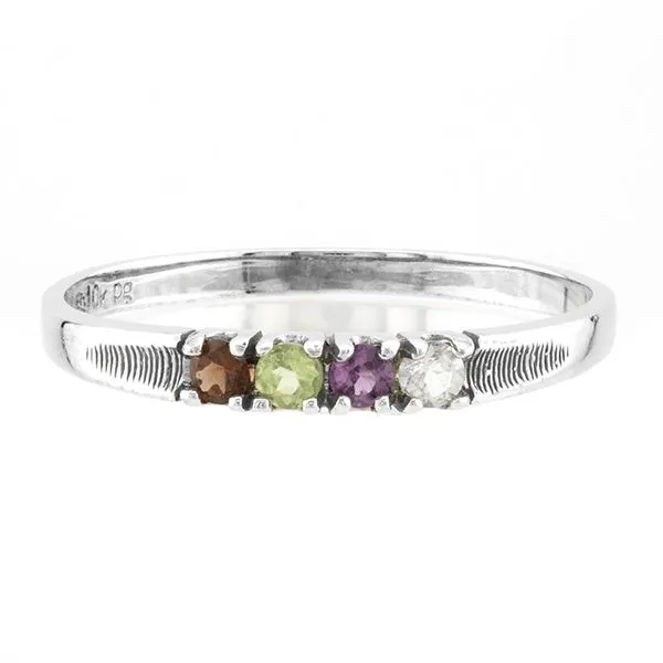 10Kt White Gold Family Ring with Garnet, Peridot, Rhodolite Garnet, and White Topaz John Anthony Jewellers Ltd. Kitchener, ON