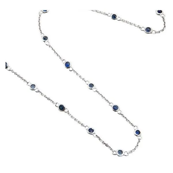 14 Karat White Gold Bezel Set Blue Sapphire 