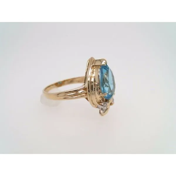 Vintage 14 Karat Yellow Gold Blue Topaz & Diamond Assymetrical Design Ring Image 4 John Michael Matthews Fine Jewelry Vero Beach, FL