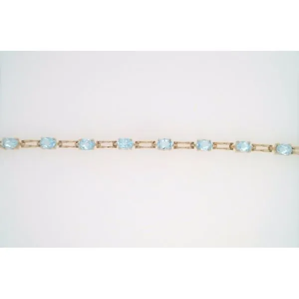 Vintage 14 Karat Yellow Gold 5 Mm Wide Sky Blue Topaz Station Bracelet 7.25