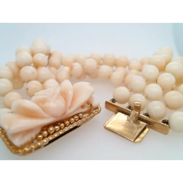 Vintage 4 Strand 18 Karat Yellow Gold Angelskin Coral Bead Bracelet With Handmade Carved Floral Angelskin Coral Clasp 6.75