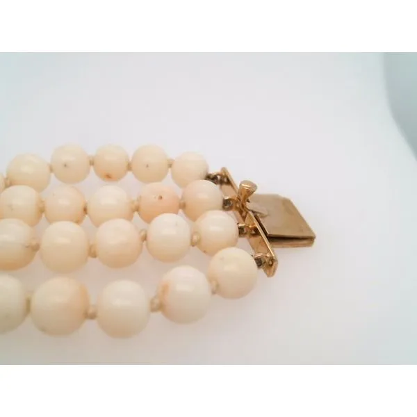 Vintage 4 Strand 18 Karat Yellow Gold Angelskin Coral Bead Bracelet With Handmade Carved Floral Angelskin Coral Clasp 6.75