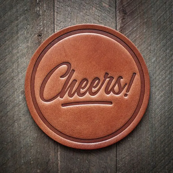 Cheers Genuine Leather Hand Pressed Tan 4 Inch Round Coaster Made in USA from Premium Harness Leather J. Schrecker Jewelry Hopkinsville, KY