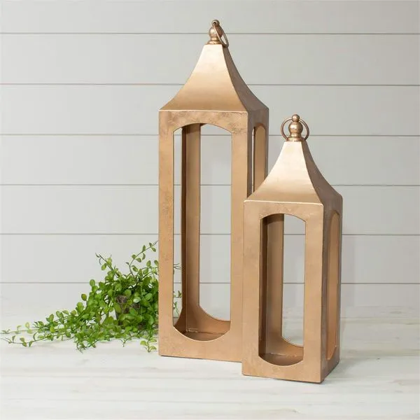 Set of Two Metallic Gold Finished Metal Lanterns with Finials J. Schrecker Jewelry Hopkinsville, KY