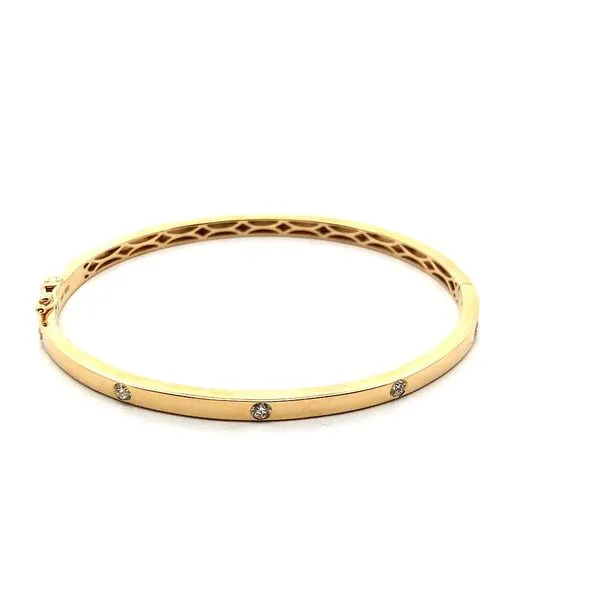 14K Yellow Gold Solid Polished Bangle Bracelet with Five Round Diamonds weighing 0.30 carats. JWR Jewelers Athens, GA