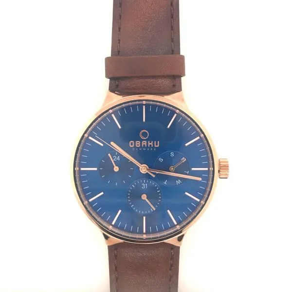 Man's Obaku Quartz Watch with a Rose Case, Round Blue Dial, a Brown Leather Strap. JWR Jewelers Athens, GA