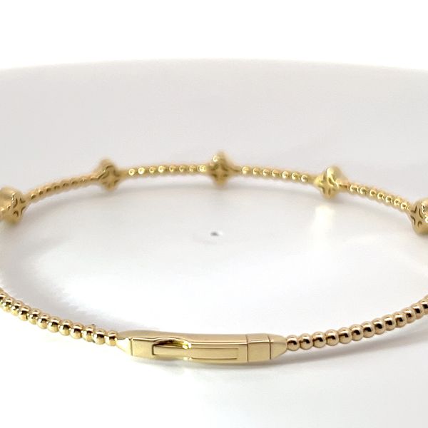 14k Yellow Gold Diamond Quatrefoil Flex Bangle Image 3 Kirk & Company Jewelers, Inc Milford, OH