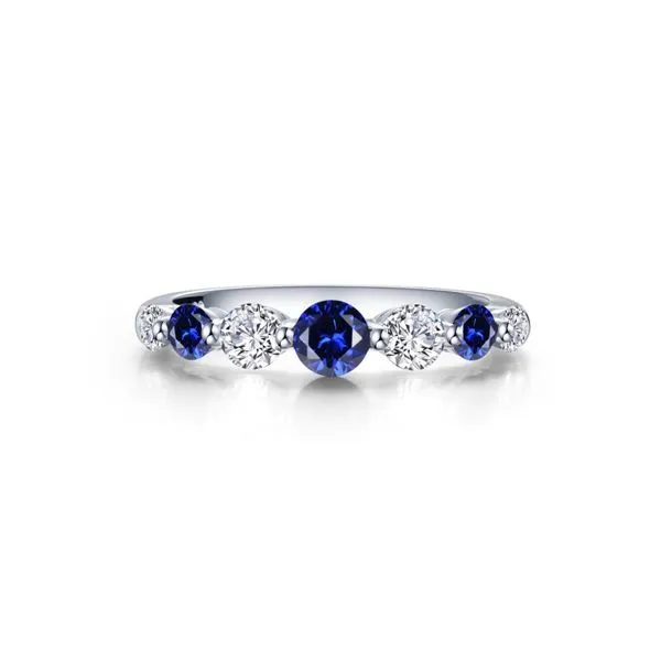 Sterling Silver and Platinum Simulated Diamond and Lab Grown Blue Sapphire 7 Symbols of Joy Half  Eternity Ring Kiefer Jewelers Lutz, FL