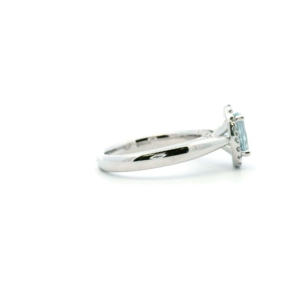 14KW Oval Aquamarine and Diamond Halo Ring Image 3 Kiefer Jewelers Lutz, FL