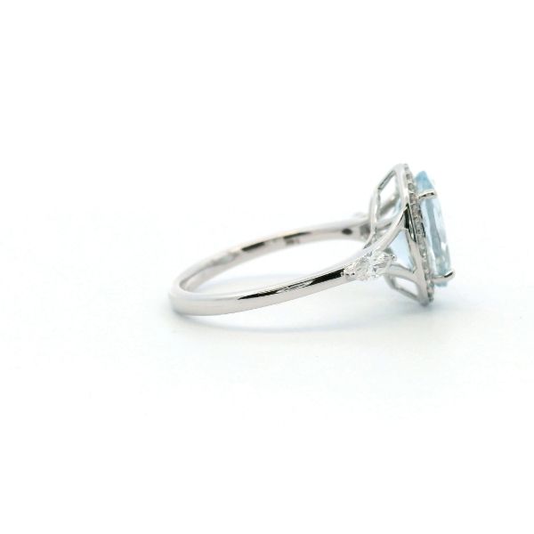 14KW Aquamarine and Diamond Halo Ring Image 3 Kiefer Jewelers Lutz, FL