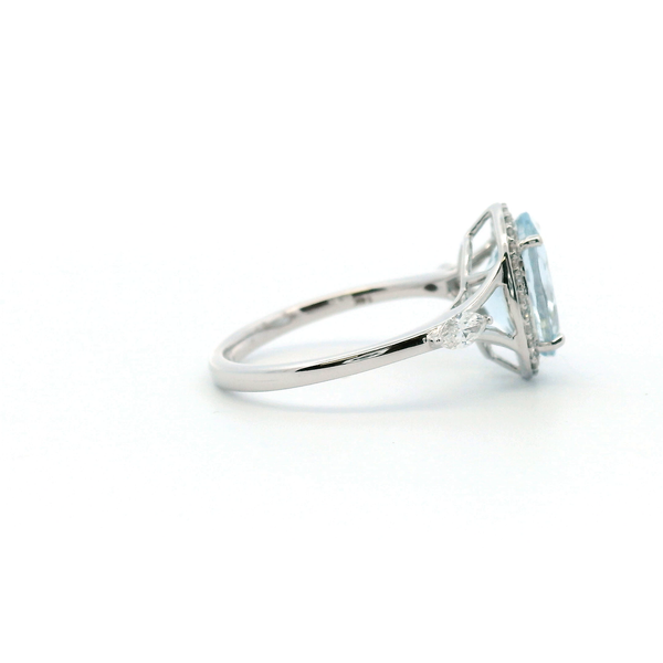 14KW Aquamarine and Diamond Halo Ring Image 3 Kiefer Jewelers Lutz, FL
