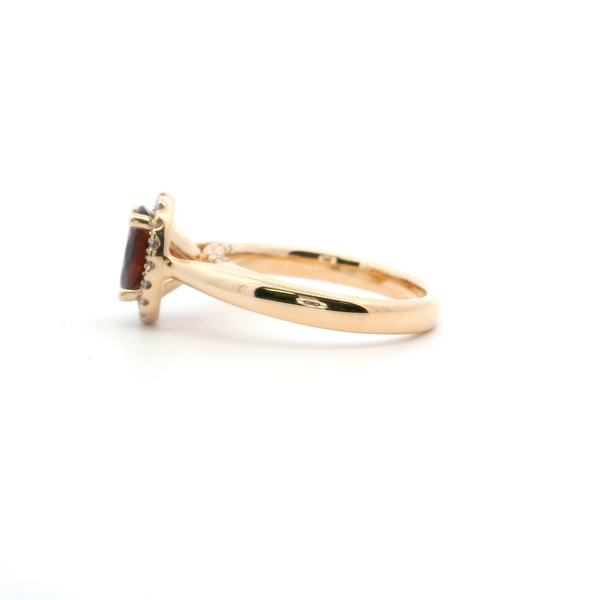 14KY Oval Garnet and Diamond Halo Ring Image 3 Kiefer Jewelers Lutz, FL